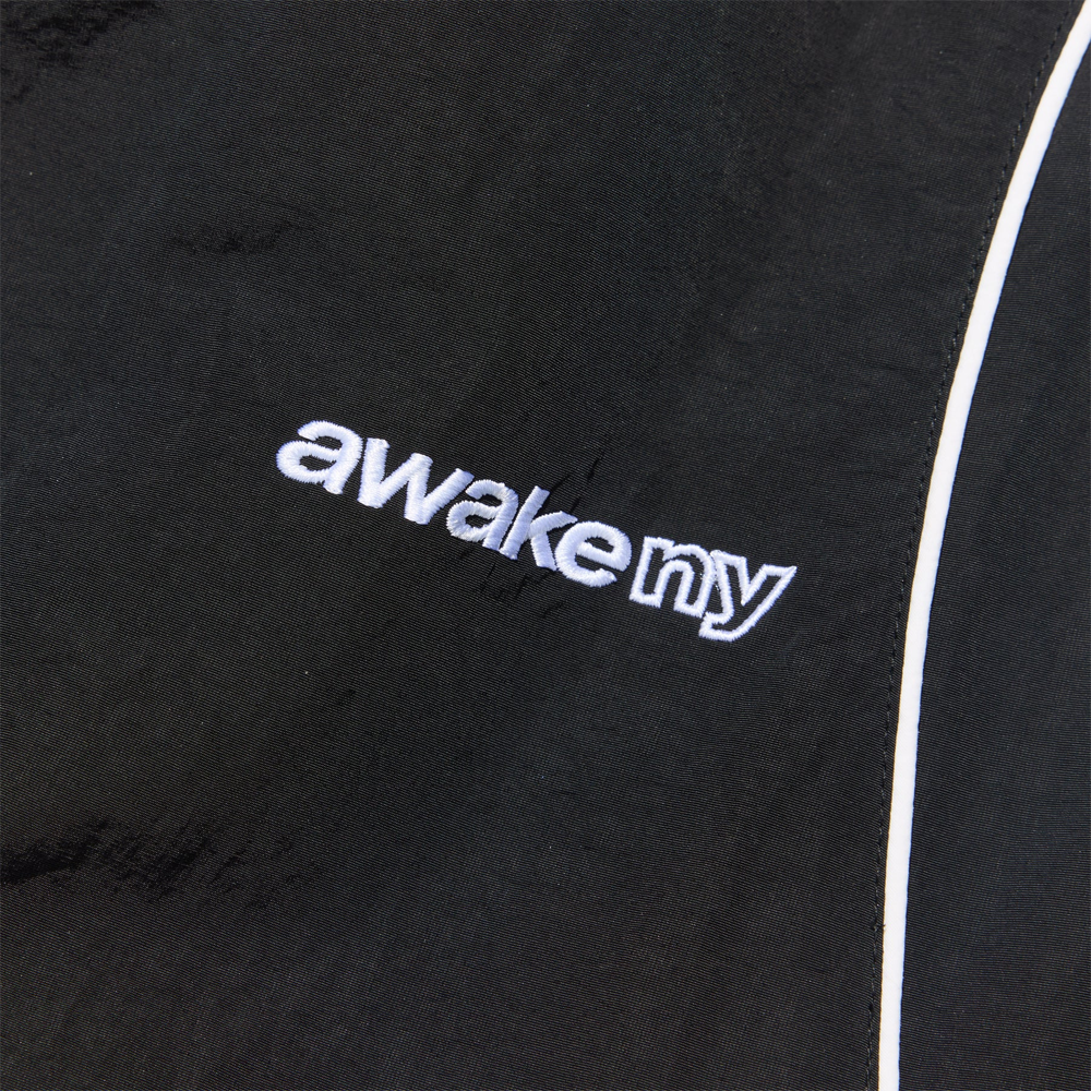 Awake Les performance track pant - Black