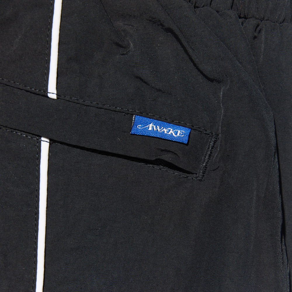 Awake Les performance track pant - Black